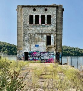 The Oklahoma Row Site at the former Monte Ne Resort, a three-story concrete tower, is listed on the National Register of Historic Places.