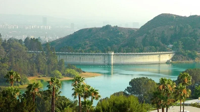 A view of Hollywood Reservoir and the back side of the Mulholland Dam — viewed from Canyon Lake Drive, Los Angeles, California. (Photo by Clinton Steeds)