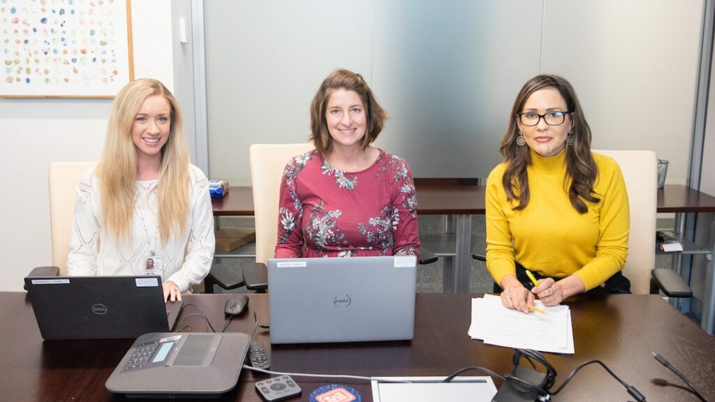 U.S. Army Corps of Engineers Transatlantic Middle East District Attorneys Cara Mroczek (center) and Rebecca Bockmann, (right) along with paralegal Lindsay Nicodemus preparing a case for trial in October 2022. Mroczek was recently named USACE’s 2023 Attorney of the Year. (Photo by Shannon R Hodges)
