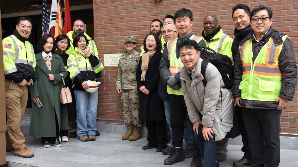 Some of the members of the project delivery team at the U.S. Army Corps of Engineers – Far East District who worked to complete the fourth and final housing tower on Camp Walker after a ribbon cutting ceremony marking its official opening on Feb. 29, 2024. An architect and civil engineer represented the team that originally created the design several years ago. In addition, members of the resident office that monitored the construction activities since the project broke ground.