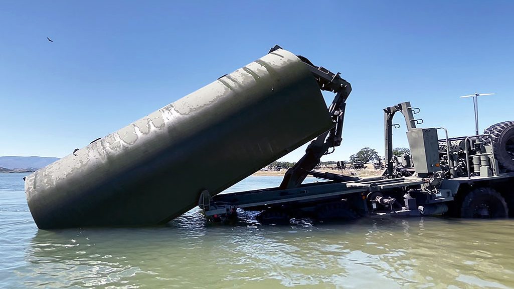 The California Army National Guard holds its annual training at Black Butte Lake over the week of April 29 – May 3. The 132nd Engineering Company (Multi-Role Bridge Company) out of Redding, California, dropped by Black Butte Lake for their weeklong annual training exercise to keep soldiers sharp on how to assemble and disassemble IRB’s – Improved Ribbon Bridges – in order to rapidly move soldiers, vehicles and equipment across lakes and rivers.