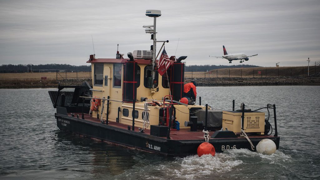 USACE debris vessel BD-6 leaves the dock during a site visit to the Patomac River Aviation Incident near Ronald Reagan Washington National Airport.