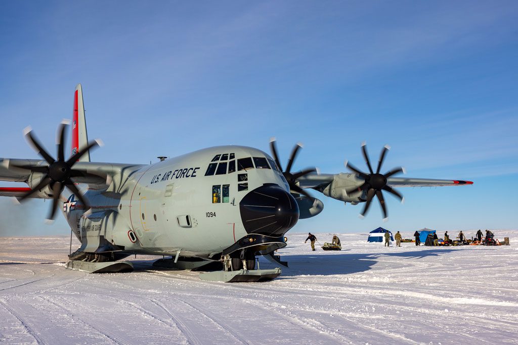 A LC-130 Hercules assigned to the 109th Airlift Wing retrieves cargo from Parsons Lake, Northwest Territories, Canada, March 5. The LC-130’s flown by the 109th Airlift Wing are the largest tactical aircraft in the world with the ability to land on snow and ice using skis.