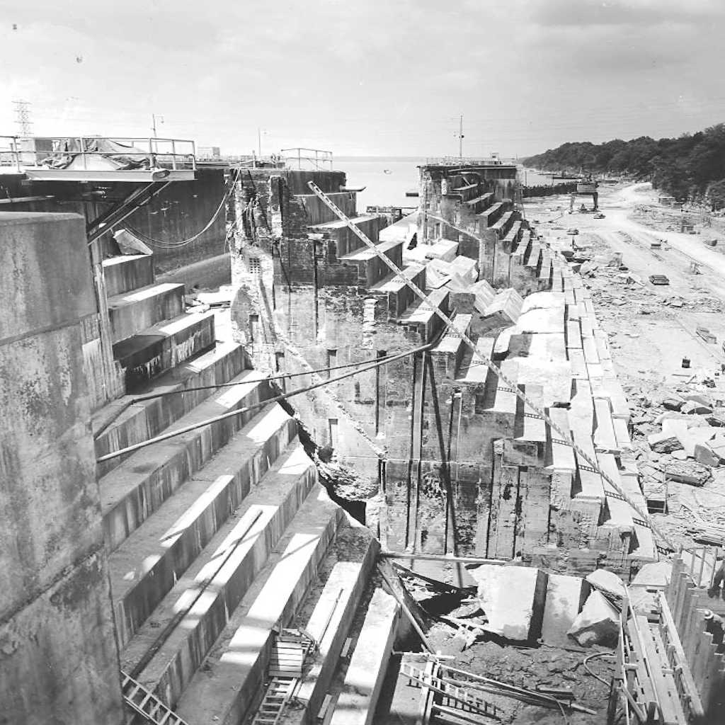 This is a view of the collapsed lock wall taken June 6, 1961, at Wheeler Lock on the Tennessee River in Rogersville, Alabama. The photo was included in a TVA report titled “Wheeler Lock Failure” written in November 1961. The report concluded that a thin seam of clay located within a shale band in the bedrock caused the failure.