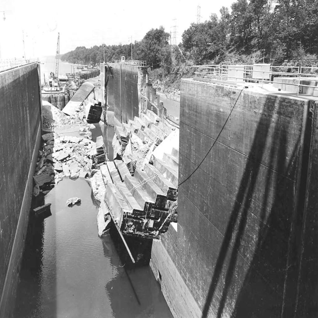 This is a view of the collapsed lock wall taken June 6, 1961, at Wheeler Lock on the Tennessee River in Rogersville, Alabama. The photo was included in a TVA report titled “Wheeler Lock Failure” written in November 1961. The report concluded that a thin seam of clay located within a shale band in the bedrock caused the failure.