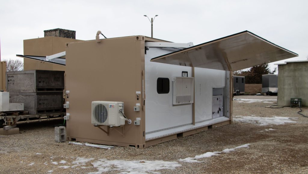 The energy node, with photovoltaic (PV) panels fully deployed, at the ERDC Forward Operating Base Laboratory in Champaign, Illinois.