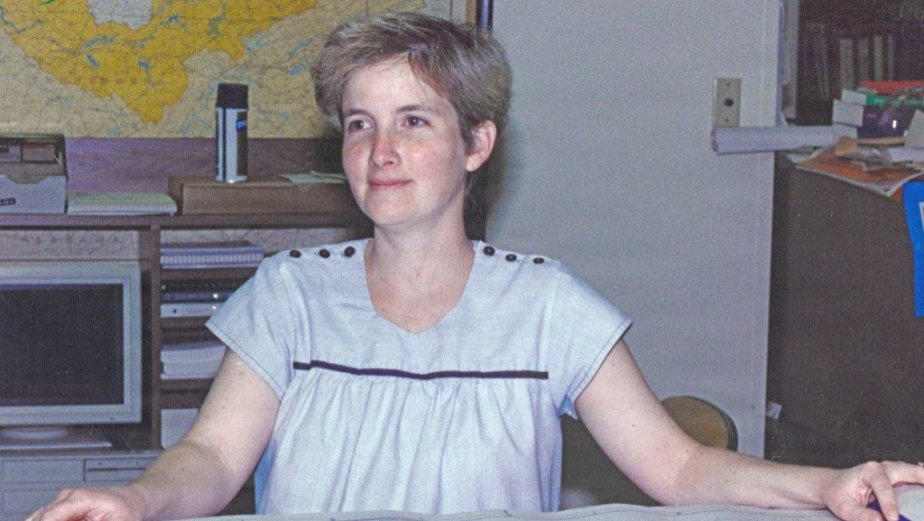 Connie Flatt reviews a project blueprint July 7, 1986, at the U.S. Army Corps of Engineers Nashville District Headquarters in Nashville, Tennessee. She recently culminated 46 years of federal service during a retirement ceremony March 31, 2026. USACE PHOTO BY LEE ROBERTS