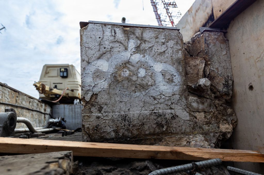 A Merty symbol is drawn on a piece of concrete during repairs at C.W. Bill Young Lock and Dam on the Allegheny River, New Kensington, Pennsylvania, March 25, 2026. USACE PHOTO BY ANDREW BYRNE