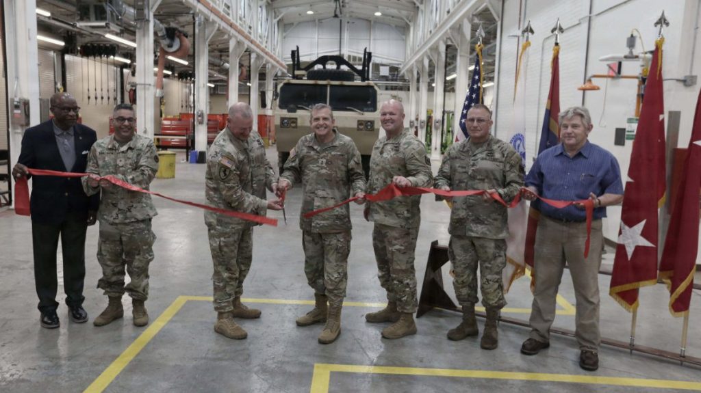 Army Reserve Lt. Gen. Robert Harter, (3rd left) Commanding General U.S. Army Reserve Command, initiates cutting the ribbon during the Equipment Concentration Site (ECS) ribbon cutting ceremony June 16, 2026 at Camp Shelby, Miss. These opening ceremonies marks the grand debut of a vital logistical hub whose storage facilities house critical rolling stock, weaponry and gear.