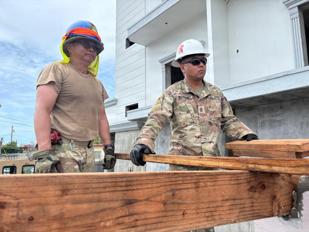 1st Sgt. Edward Martinez, construction manager for the 797th Engineer Vertical Construction Company, supports temporary roofing operations in Saipan, Commonwealth of the Northern Mariana Islands, following Super Typhoon Sinlaku. Martinez, a Guam native and FEMA reservist with 20 years of Army Reserve service, previously helped install temporary roofs across Guam after Typhoon Mawar in 2023 and now continues supporting disaster recovery efforts alongside fellow Army engineers assisting island communities in need. USACE PHOTO BY PACO HAMM