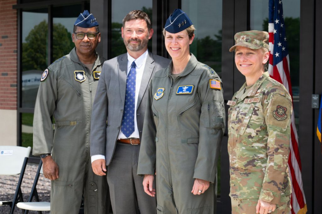Conducting ribbon-cutting honors were (from left) U.S. Air Force Gen. Randall Reed, United States Transportation Command commander, Ian Mitchell, U.S. Army Corps of Engineers Louisville District engineering division chief, Lt. Gen. Rebecca Sonkiss, Air Mobility Command interim commander, and Brig. Gen. Michele Lo Bianco, 618th Air Operations Center commander. The new Joint Operations and Mission Planning Center officially opened on Scott Air Force Base, May 29, 2026. The center will support around-the-clock operations and strengthen the military's ability to plan, task, execute, and assess global air mobility missions. (U.S. Air Force photo by Senior Airman De’Quan Simmons)