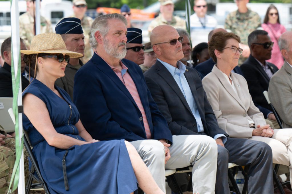 Attending the Joint Operations and Mission Planning Center ribbon-cutting ceremony on May 29, 2026, were former commanders from Air Mobility Command and U.S.Transportation Command, as well as civic leaders and congressional representatives. The JOMPC will support around-the-clock operations and strengthen the military's ability to plan, task, execute, and assess global air mobility missions. (U.S. Air Force photo by Senior Airman De’Quan Simmons)