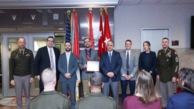 Members of the Pittsburgh District’s Upper Ohio Navigation Project, Montgomery Lock New River Chamber Design/Construction Project Deliver Team was recognized as the PDT of the year from the 56th Chief of Engineers and Commanding General of the U.S. Army Corps of Engineers Lt. Gen. William H. "Butch" Graham, Jr. and Command Sergeant Major Douglas Galick at a ceremony held at the USACE headquarters building in Washington, D.C. on January 23, 2026. U.S. ARMY PHOTO BY DIANE RIVERA ESTELLA