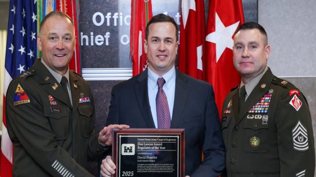 South Atlantic Division Technology Program Manager,
David Shaeffer (center), receives the Don Lawyer Award for Regulator of the Year from the 56th Chief of Engineers and Commanding General of the U.S. Army Corps of Engineers Lt. Gen. William H. "Butch" Graham, Jr. and Command Sergeant Major Douglas Galick at a ceremony held at the USACE headquarters building in Washington, D.C. on January 23, 2026. U.S. ARMY PHOTO BY DIANE RIVERA ESTELLA